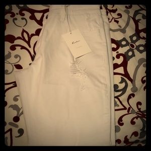 Distressed white kancan skinny jeans